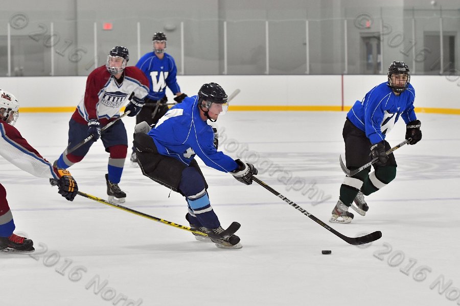 Wheaton College Men\'s Ice Hockey vs Middlesex Community College. - Photo By: KEITH NORDSTROM